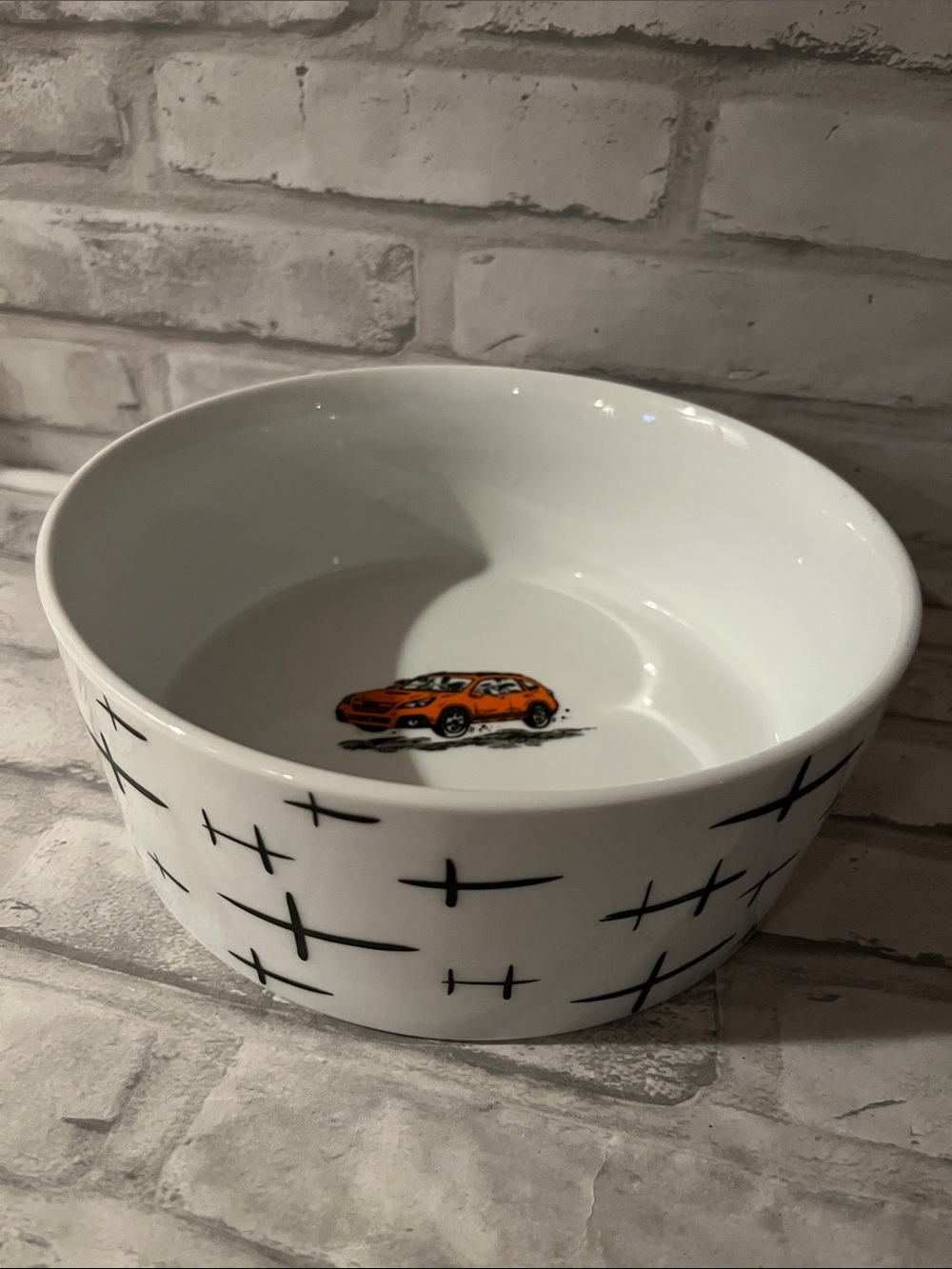 White Ceramic dog dish Bowl with Orange Car Accent and dogs